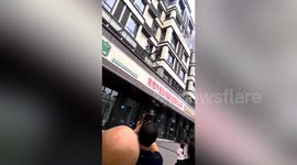 Man scales 3 floors to save toddler from burning flat in China