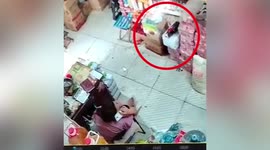 Bottled soy sauce suddenly explodes, spraying woman in Chinese shop