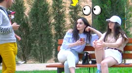 Georgian prankster raises eyebrows and laughs with giant cucumber in his trousers
