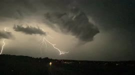 Lightning strike streaks across whilst storm chasing, South Germany.