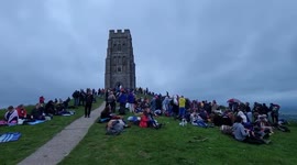 Hundreds gather at Glastonbury Tor to celebrate summer solstice