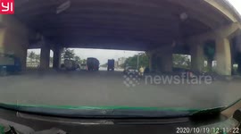 Rider and pillion passenger survive collision with lorry