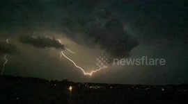 Lightning strikes streak across Germany skies from a supercell severe thunderstorm warning