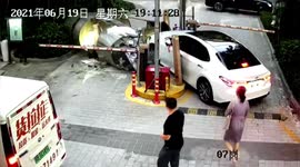 Car knocks down booth with security guard inside after Chinese motorist accidentally presses accelerator