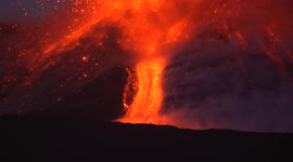 Mount Etna erupts spectacularly spewing lava into Sicilian night sky