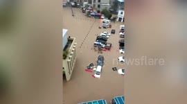 Flash floods submerge streets after heavy rainstorm strikes southern China