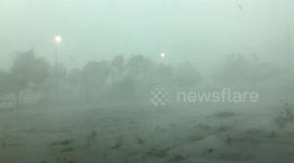 Hurricane-Force Winds of Derecho Storm Hit Interstate Car Park (USA)