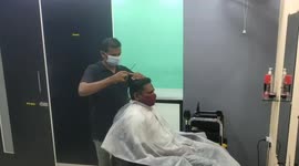 A saloon in South India gives 50 percent discount to its vaccinated customers