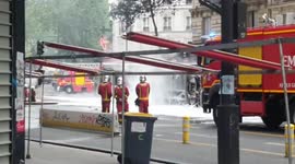 Parisian firefighters extinguish bus that exploded into flames