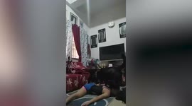 Pet dog interrupts owner during her gymnastics training