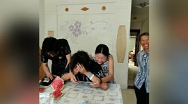 Chinese boy cries tears of joy after getting high score in university entrance exam