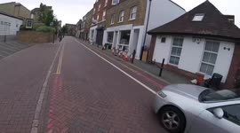 KV19ZVB making a very close pass in front of the parked cars, the action was taken by MET