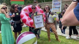 Tourism and travel industry workers demonstrate outside Houses of Parliament in London