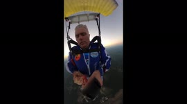 US skydiver eats taco and plays catch whilst at 14,000 feet in the air