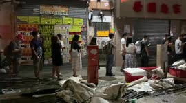 Hongkongers queue around the block after midnight to purchase last edition of Apple Daily