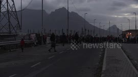 Langa residents block roadway as homes fill up with waste water