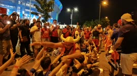 French fans party with men disguised as Obelix, national symbol