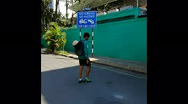 Indian man nails football-in-backpack trickshot
