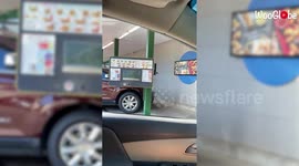 'Sonic' employee totally fails at rollerskating food