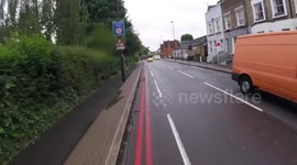 RX16DPN texting while overtaking, with a dog on her lap doesn't take this driver far