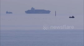 Optical illusion sees ship appear to hover above sea off UK's coast