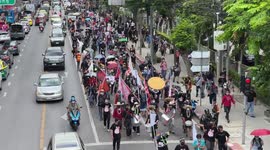 Thousands of protesters march through Thai capital Bangkok as unrest resumes