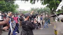 Rizieq's Supporters and Police Clash Outside the Court Arena in East Jakarta Indonesia
