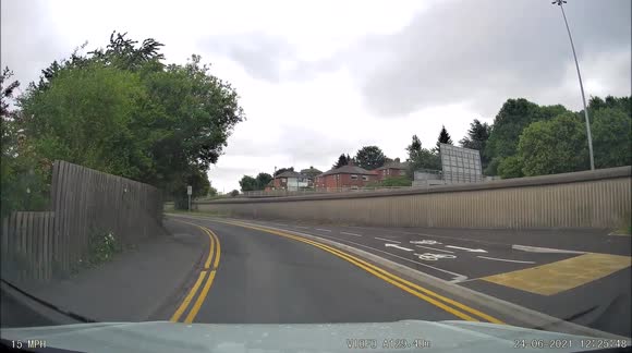 deliveroo bicycle rider on Mobile phone putting others at risk
