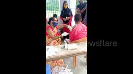 Absent-minded nurse filmed jabbing COVID vaccine patient with empty syringe