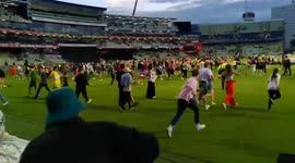 Chaos as hundreds of students invade Edgbaston cricket ground in Birmingham, UK