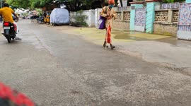 Hindu religion older man temple rute in the small rain nice slowwalking 4k footage