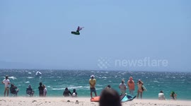 Dozens attend kitesurfing world cup as rider soar above waves off Spain's south coast