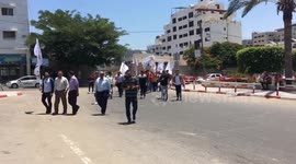 Palestinian factions in Gaza organized a vigil in Gaza to protest the killing of Nizar Banat in the West Bank.