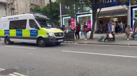 Police vans rushing to scene of protest in central London