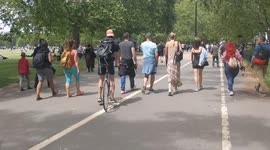 Mass anti-lockdown protest marching down Oxford Street near Hyde park