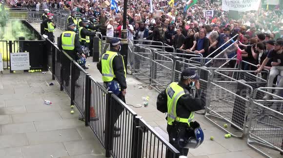 Scuffles between police and anti-lockdown protestors outside Downing Street, London