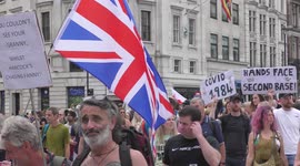 Tens of thousands of anti-vaccine, anti-lockdown protesters gather in London