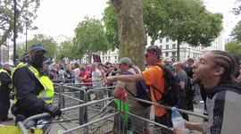 Anti-vaccine, anti-lockdown protesters confront police outside Downing Street in London