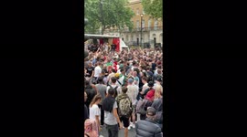 Watch moment a massive rave takes outside 10 Downing Street in front of bemused police officers