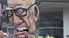 Extinction Rebellion protesters march to Rupert Murdoch's London HQ