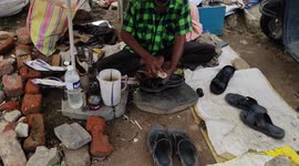 Chappal and sleepers repair worker self jab daily laber working 4k footage