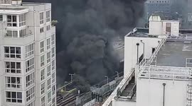 Further footage: Dozens of firefighters tackle a huge blaze near Elephant and Castle train station in London