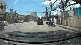 Reckless motorcyclist crashes into parked car