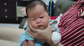 Newborn baby fall asleep while burping after milk feeding