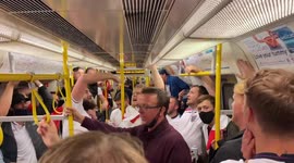 Thousands of England funs travelling to Wembley Stadium, singing
