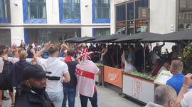 England fans chant '10 German bombers' song in Leicester Square before Germany game