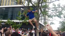 England fan climbs tree and lets off flare ahead of Euros England clash with Germany