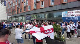 Hopeful England fans sing 'Three Lions' outside Wembley ahead of Germany clash