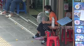 Thai massage girls wait patiently for customers amid Covid-19 desolation