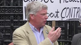Speaker Jeff Wyatt at the Resist, Defy, Do NOT Comply! - No More Lockdowns protest at Parliament Square, London, UK